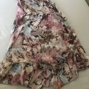 Size Small. Beautiful and breezy summer top!! Hides enough but shows plenty!